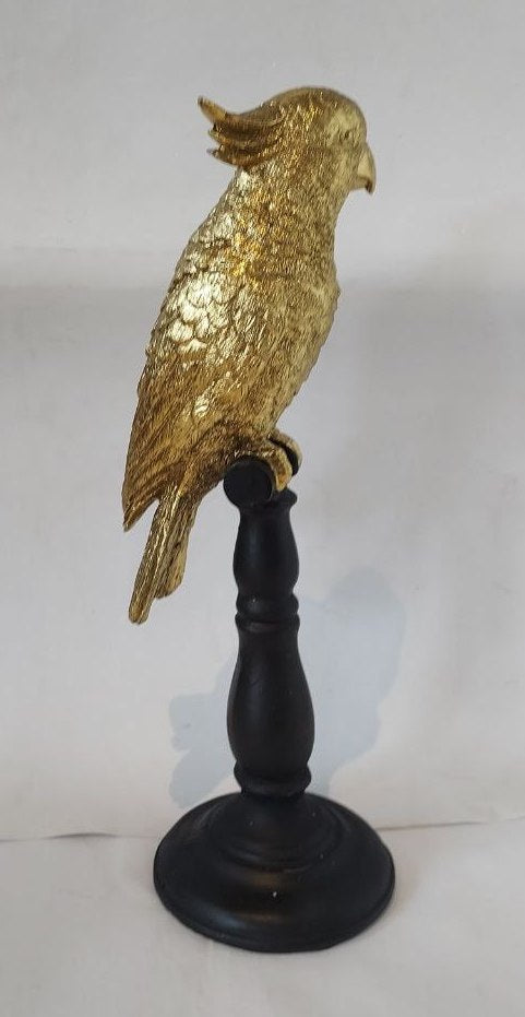 Perroquet en résine dorée